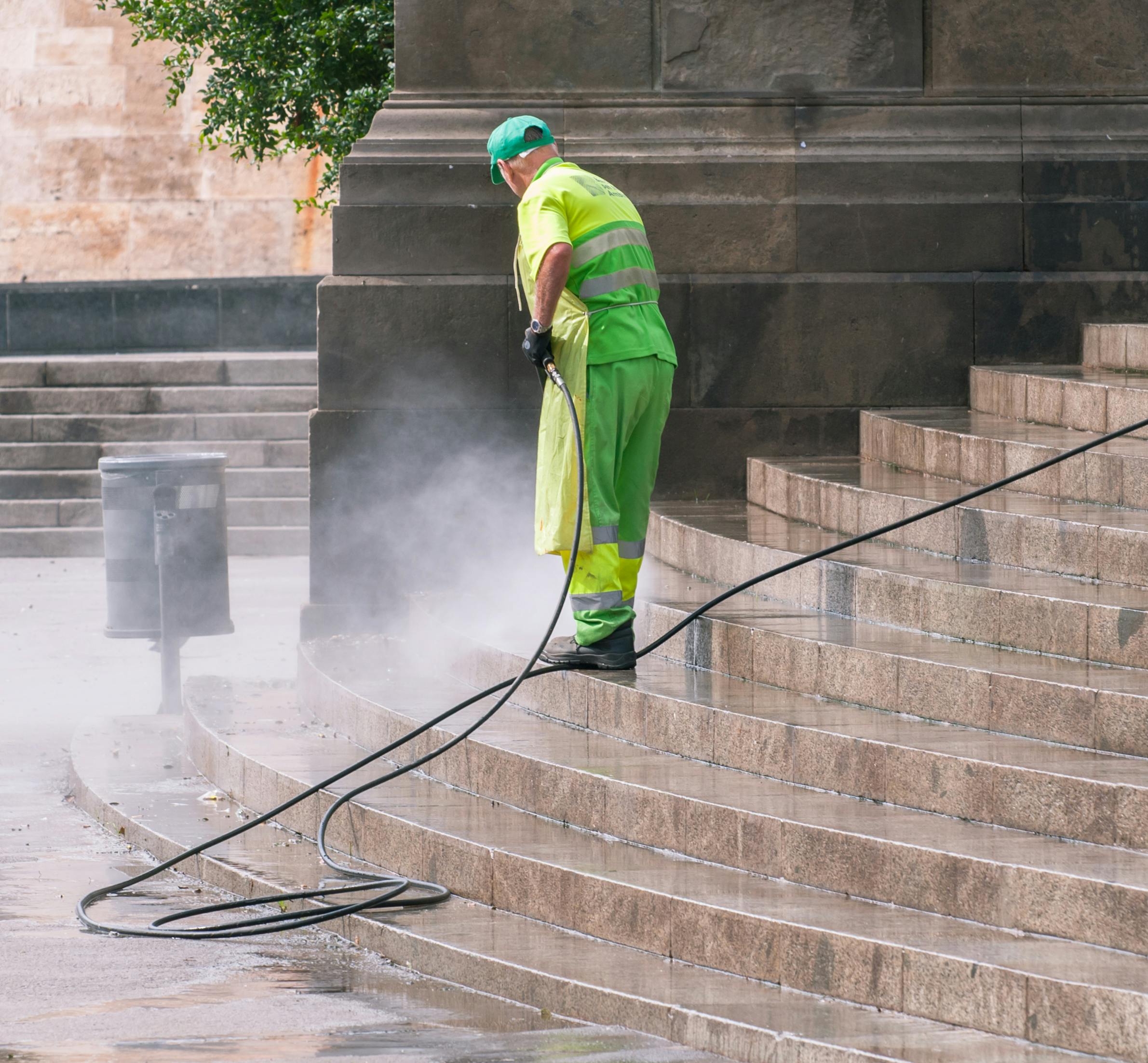 Professional pressure washing exterior surfaces